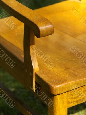 Old wood chair on grass, detail