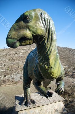 front of dinosaur big doll