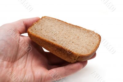 Piece of the pumpernickel in hand