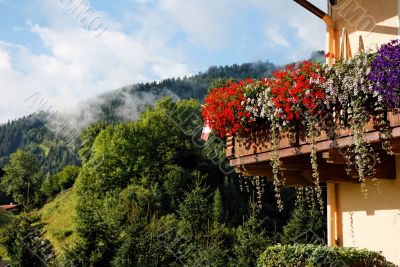 Alpine chalet balcony with flowers