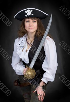 The girl - pirate with a sabre in hands