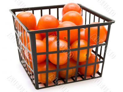 small tomatoes in the basket