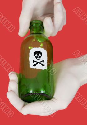 Green bottle with skull and crossbones