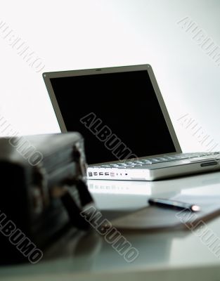 Suitcase and Laptop