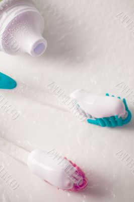 toothpaste and toothbrushes
