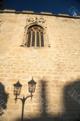 window and lamppost shadow