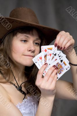 Portrait girl with a playing-cards