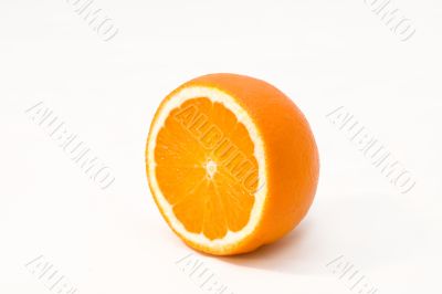 Slice of fresh orange on a white background