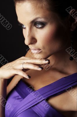 brunette fashion girl in violet dress