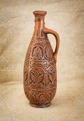 Ancient brown ceramic bottle