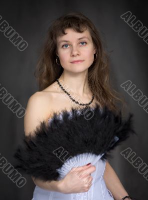 Portrait of the girl with a fan