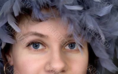 Portrait of the girl with a boa closeup