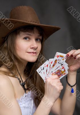 Portrait girl with a playing-cards