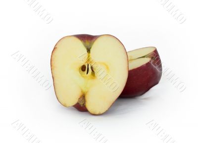 The cut apple on a white