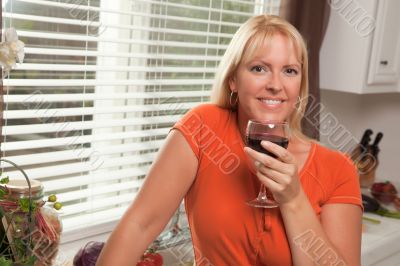 Attractive Blond with a Glass of Wine