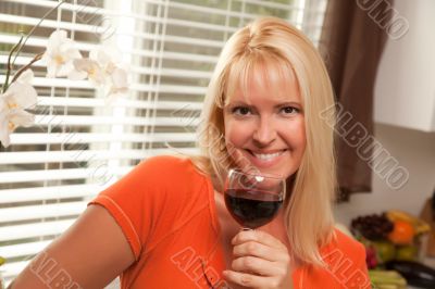 Attractive Blond with a Glass of Wine