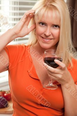 Attractive Blond with a Glass of Wine