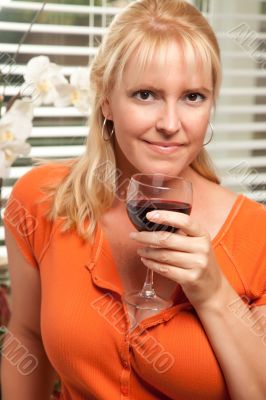 Attractive Blond with a Glass of Wine