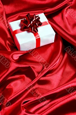 gift box on red satin background