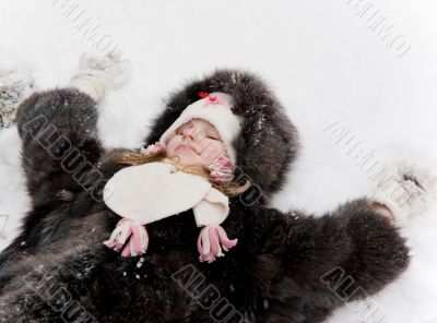little girl on the snow
