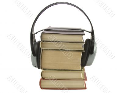 audiobook conception with headphones and books