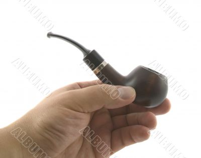 Hand of man with a smoking tobacco-pipe isolated over white