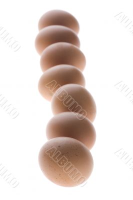 Yellow egg on white background