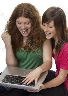 Two teenagers with laptop computer