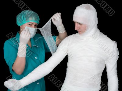 Doctor give bandaged patient