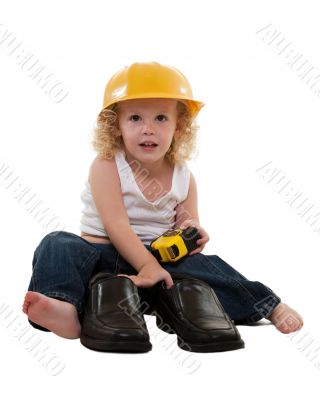 Little boy with grown up man shoes