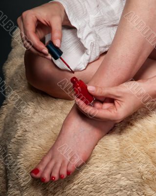 Putting on nail polish