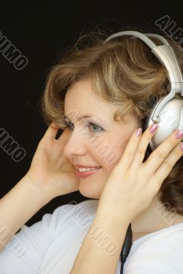 The young girl with headphones