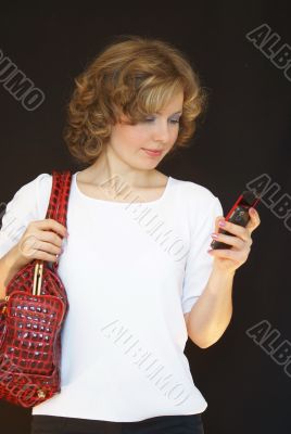 The young girl with mobile