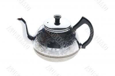 metal teapot on white