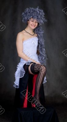 Portrait of the sexy beautiful girl with a boa