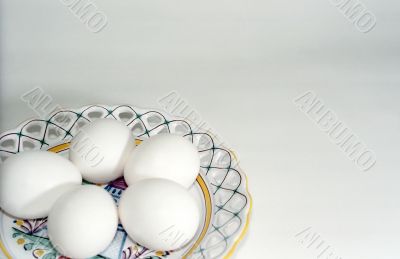 White eggs on the plate