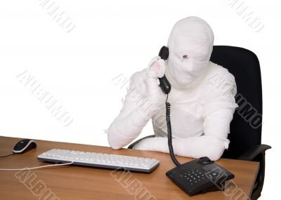Bandaged man in office