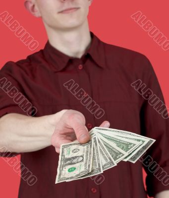Man with pack of dollars