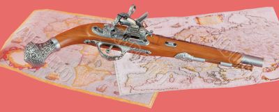 Ancient pistol on maps background
