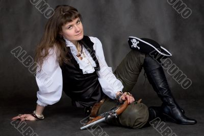 Girl with pistol and pirate hat
