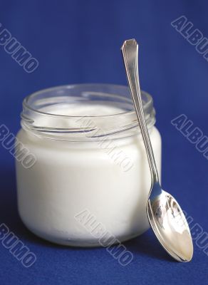 yogurt on blue background