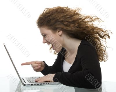 red haired teenager with laptop