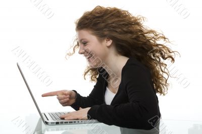 red haired teenager with laptop