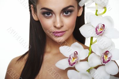 Sexy young woman with flowers