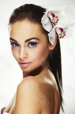 Sexy young woman with flowers
