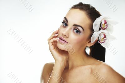 Sexy young woman with flowers