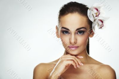 Sexy young woman with flowers