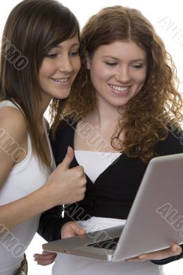 Two teenagers with laptop computer
