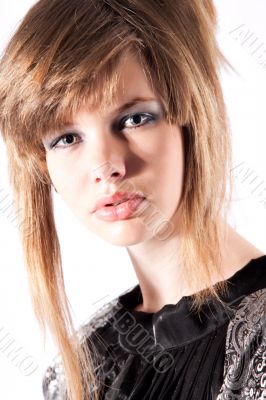 Close-up of a beautiful teenage girl in classical dress
