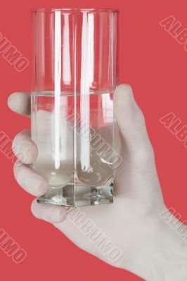 Glass of water on hand